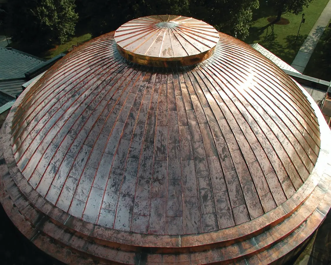 Craftsman Roofing crew installing a new roof in Greenville